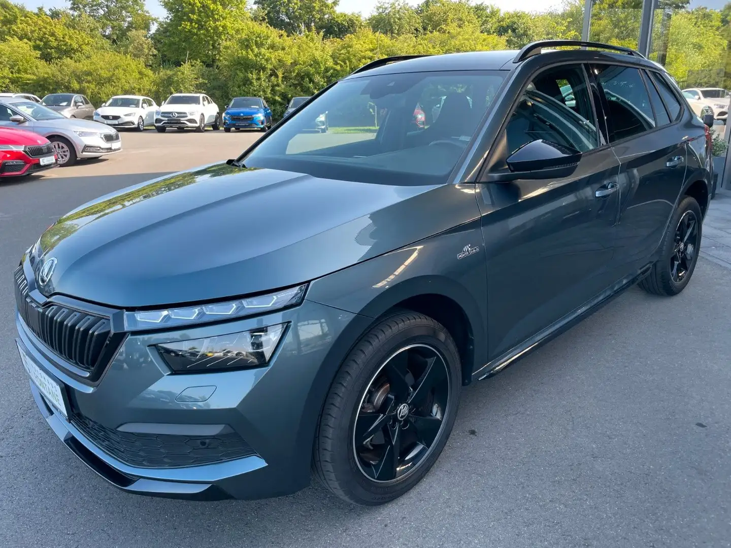 Skoda Kamiq 1,5TSI DSG Monte Carlo Virtual Matrix Navi Grau - 1