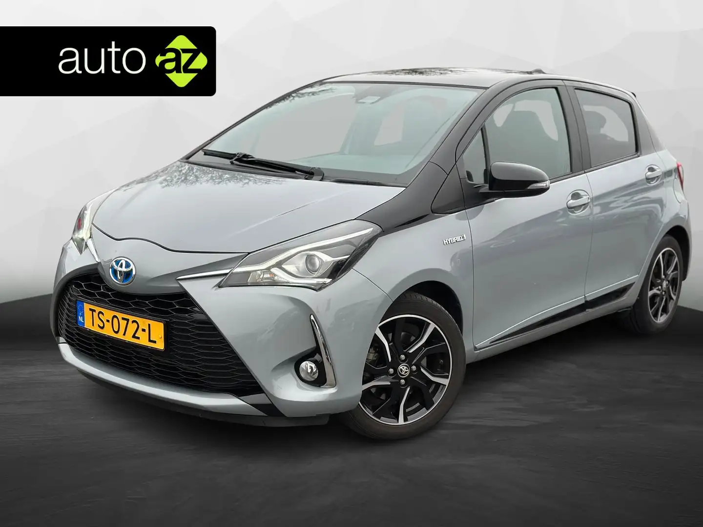 Toyota Yaris 1.5 Hybrid Bi-Tone Plus Aut. | Pano | Camera | Cru Gris - 1