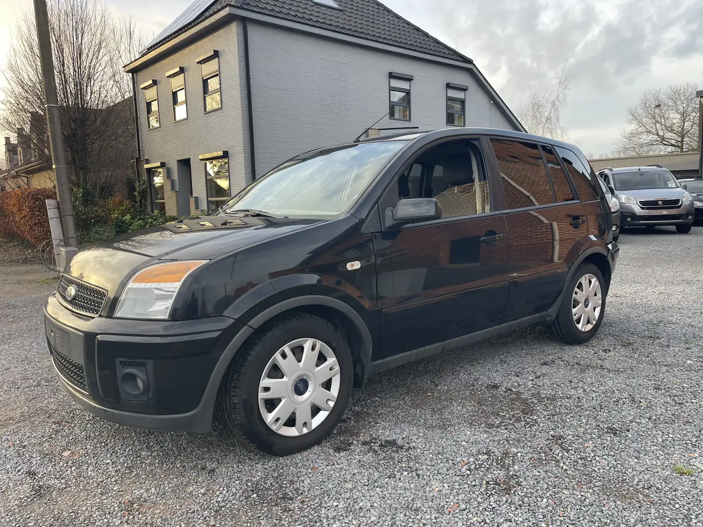 Ford Fusion 1.4 TDCI ,Airco,1e eigenaar,... Negru - 1