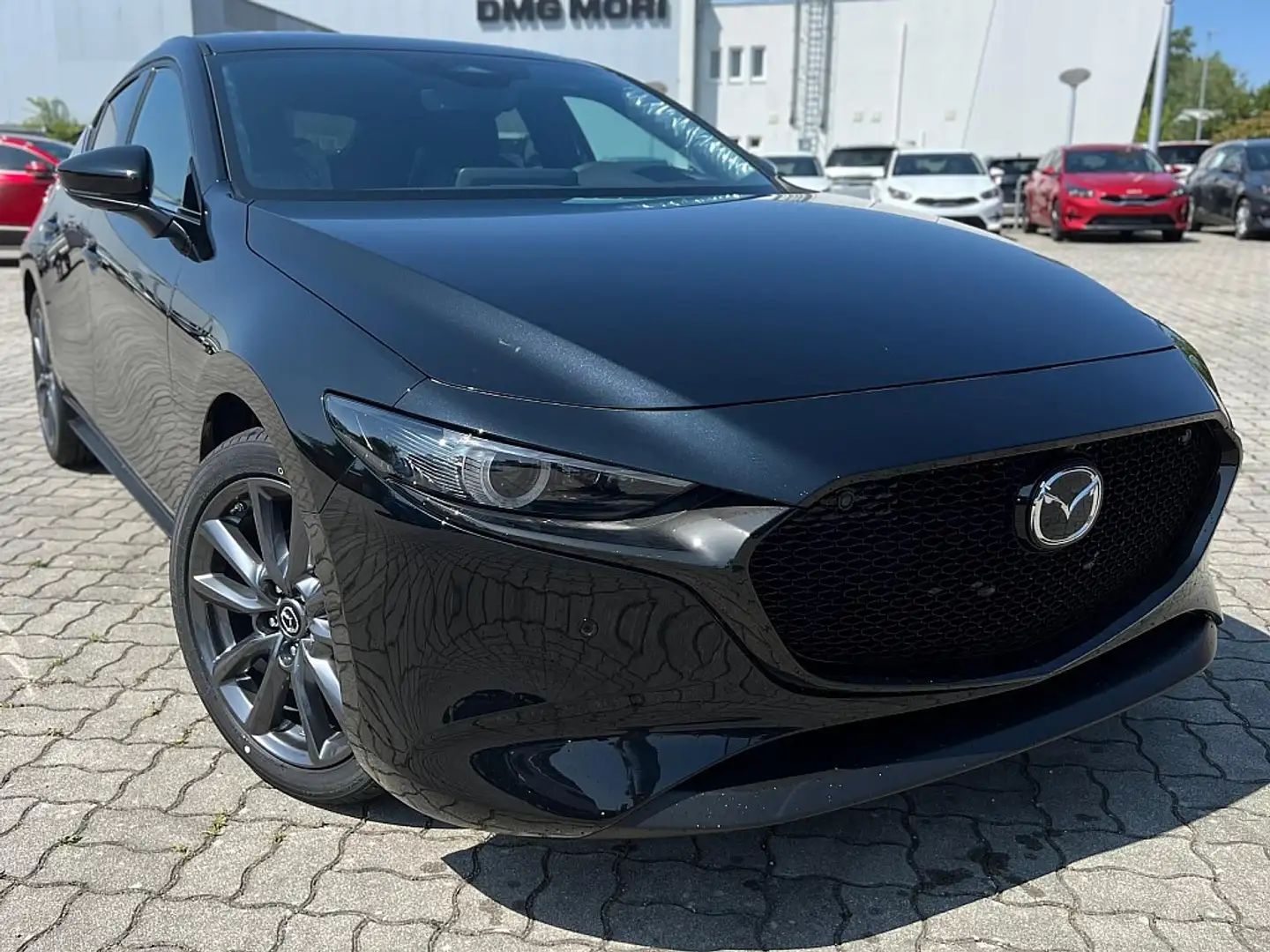 Mazda 3 Mazda3 e-Skyactiv-G140 Homura Aut. Schwarz - 1