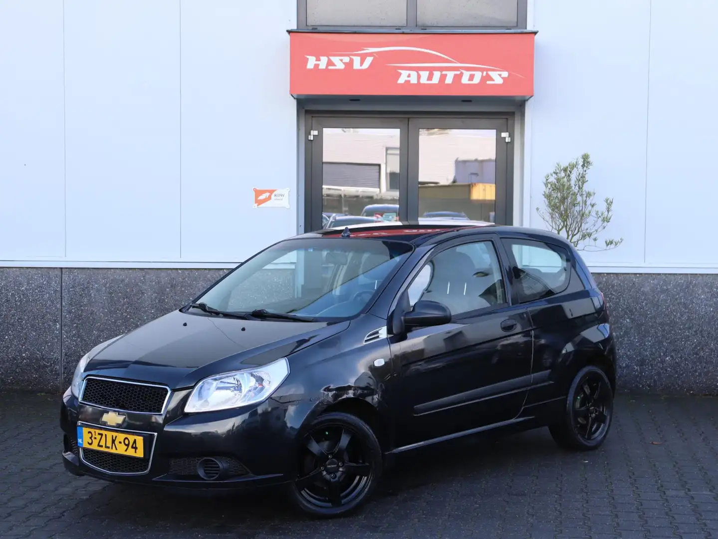 Chevrolet Aveo 1.2 16V LS B-clever Première *apk 06-2026* Zwart - 1