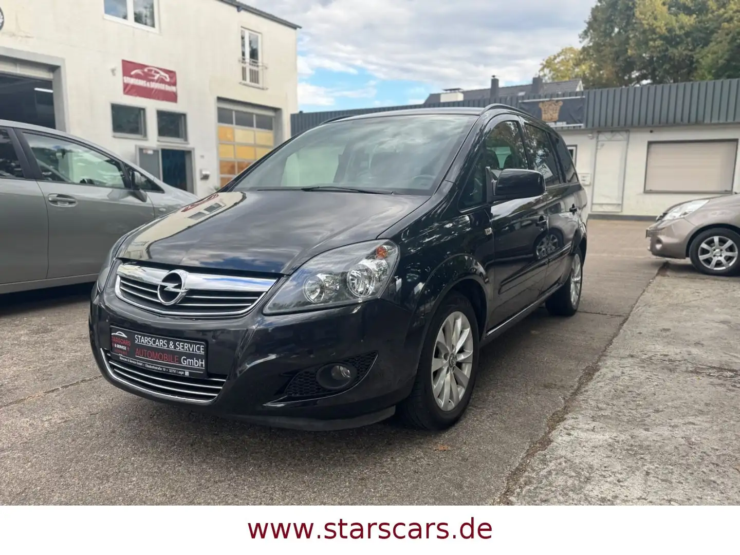 Opel Zafira B Family*KLIMA*ALU*AHK*NAVI*7-SITZER!! Schwarz - 1