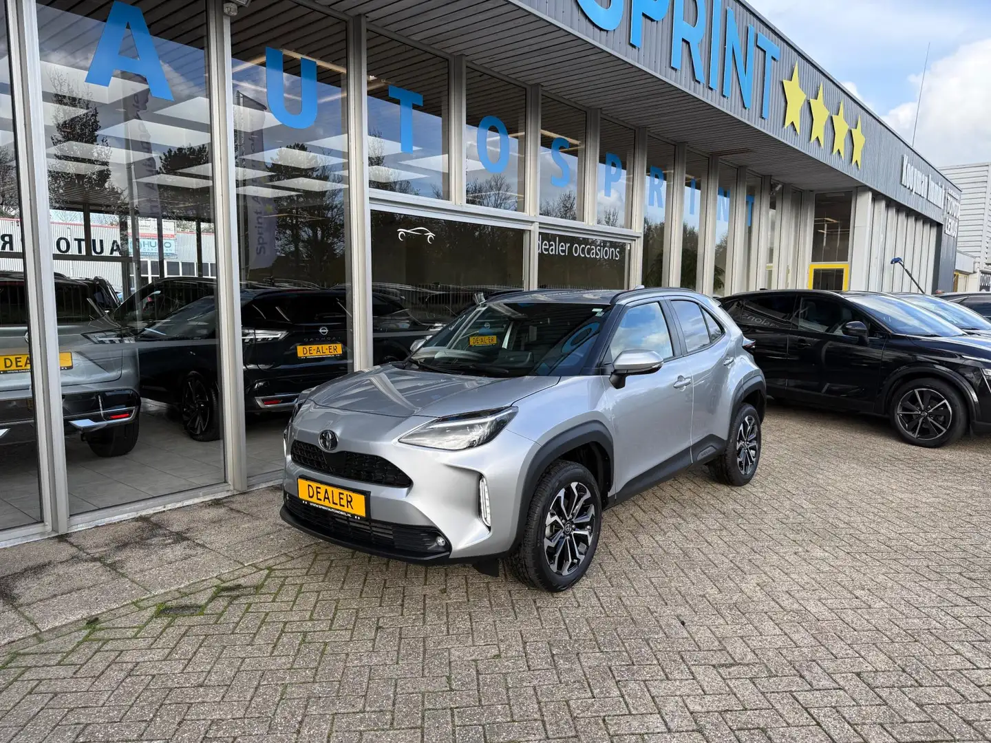 Toyota Yaris Cross 1.5 Hybrid Business / ACHTERUITRIJCAMERA / CARPLAY Zilver - 1