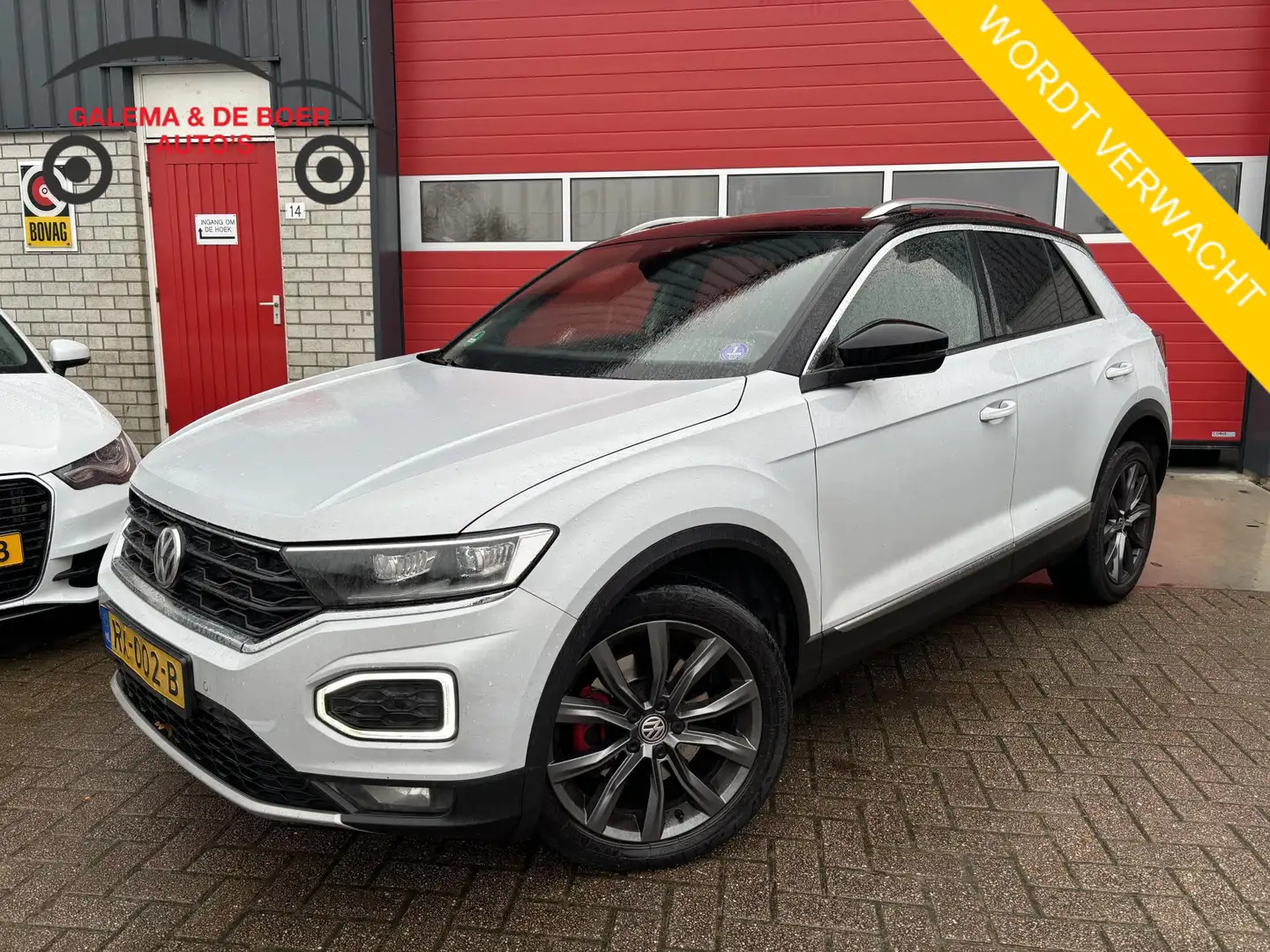 Volkswagen T-Roc 2.0 TSI 4Motion Sport AUTOMAAT / PANORAMADAK / CAM Wit - 1