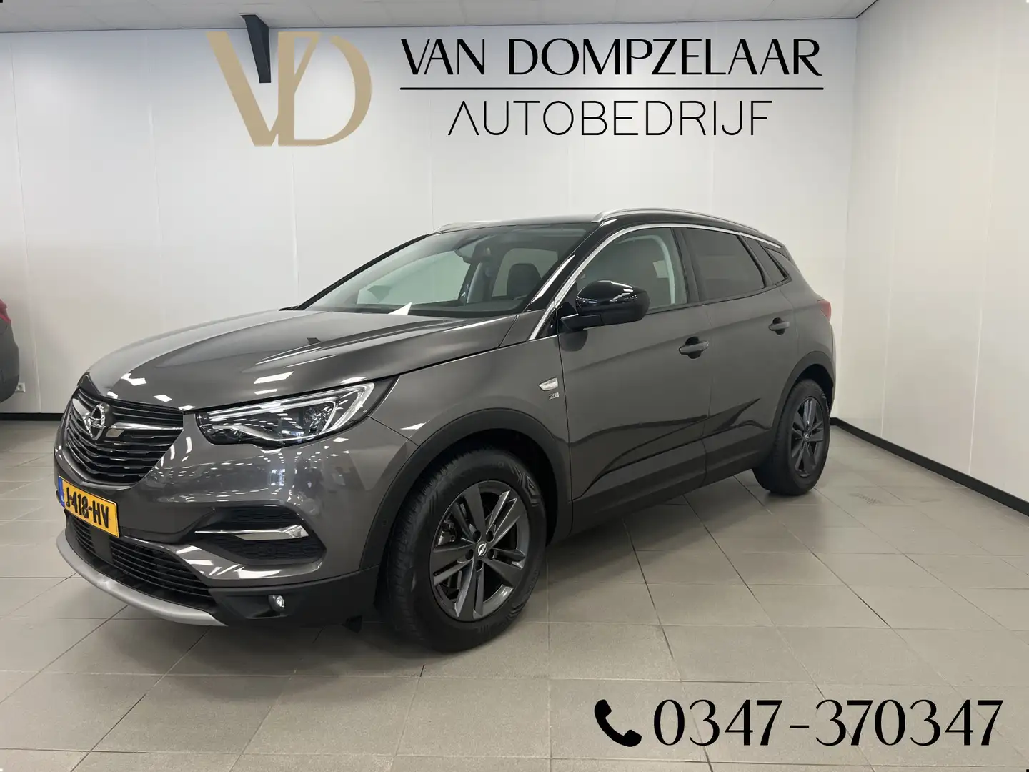 Opel Grandland X 1.2T 130PK / 120 Jaar Edition / NAVI / CAMERA / CA Grijs - 1
