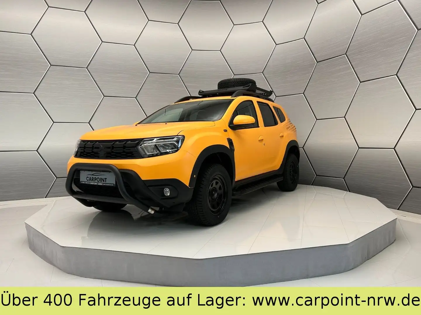 Dacia Duster TCe 150 4WD CARPOINT Off-Road Safran Gelb Orange - 1