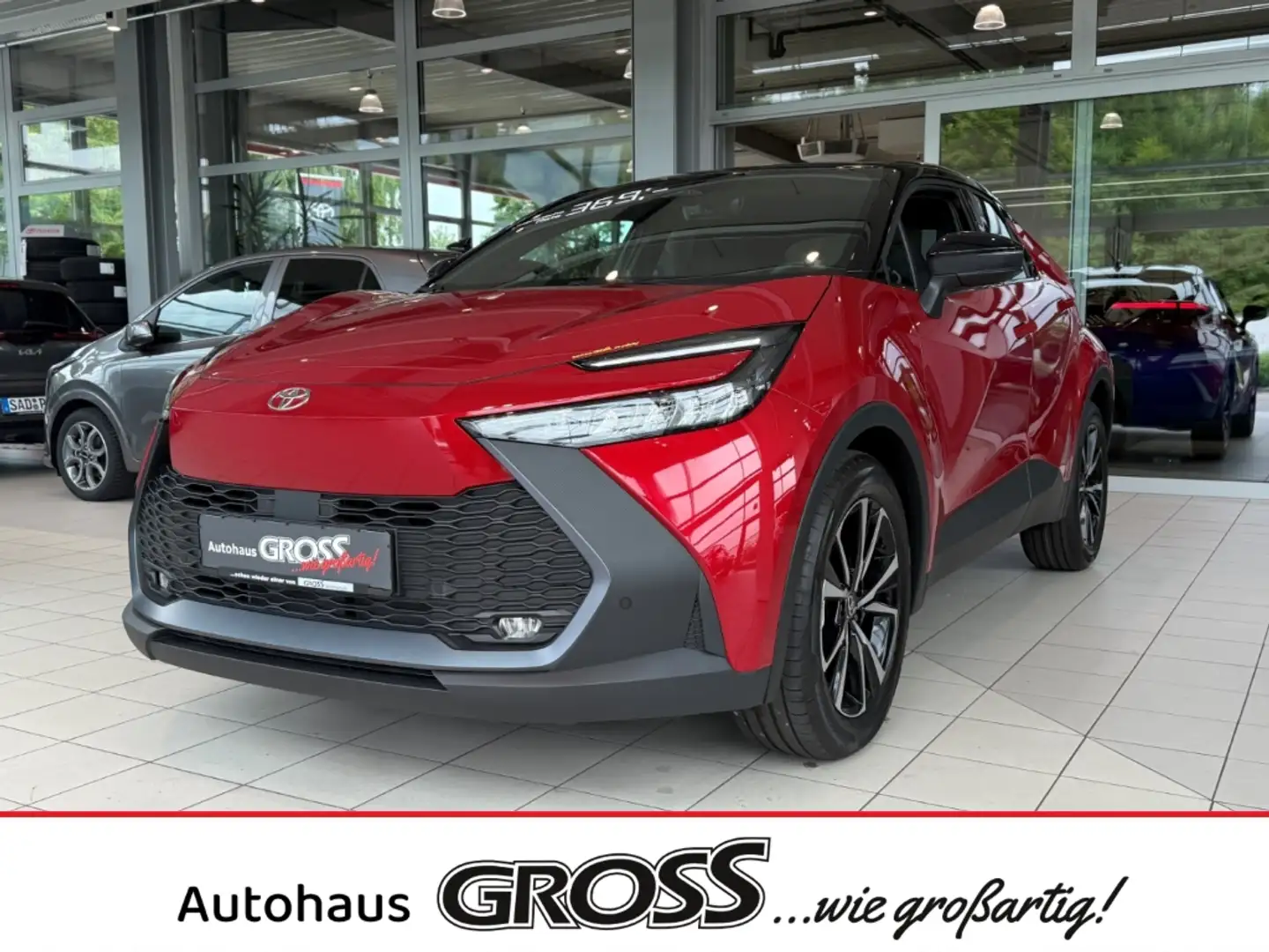 Toyota C-HR Hybrid FWD Team Deutschland 2.0 Navi ACC Apple Car Rood - 1