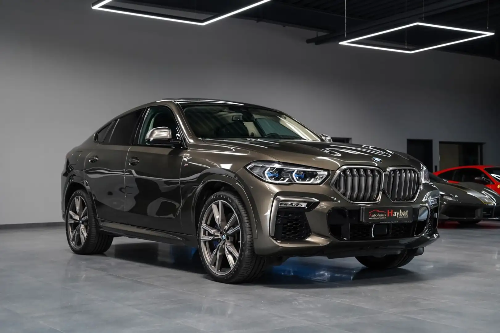 BMW X6 M i Exclusiv-Laser-Pano-HarmanK-Carbon-22" Коричневый - 1
