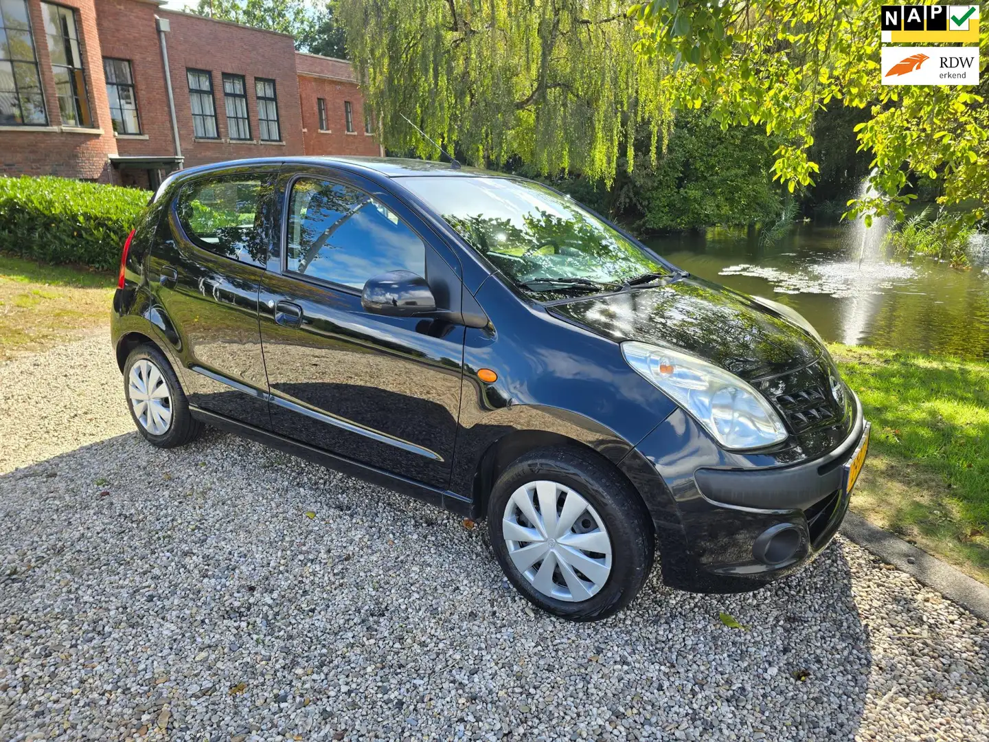 Nissan Pixo 1.0 Acenta AIRCO *apk:08-2026* Zwart - 1