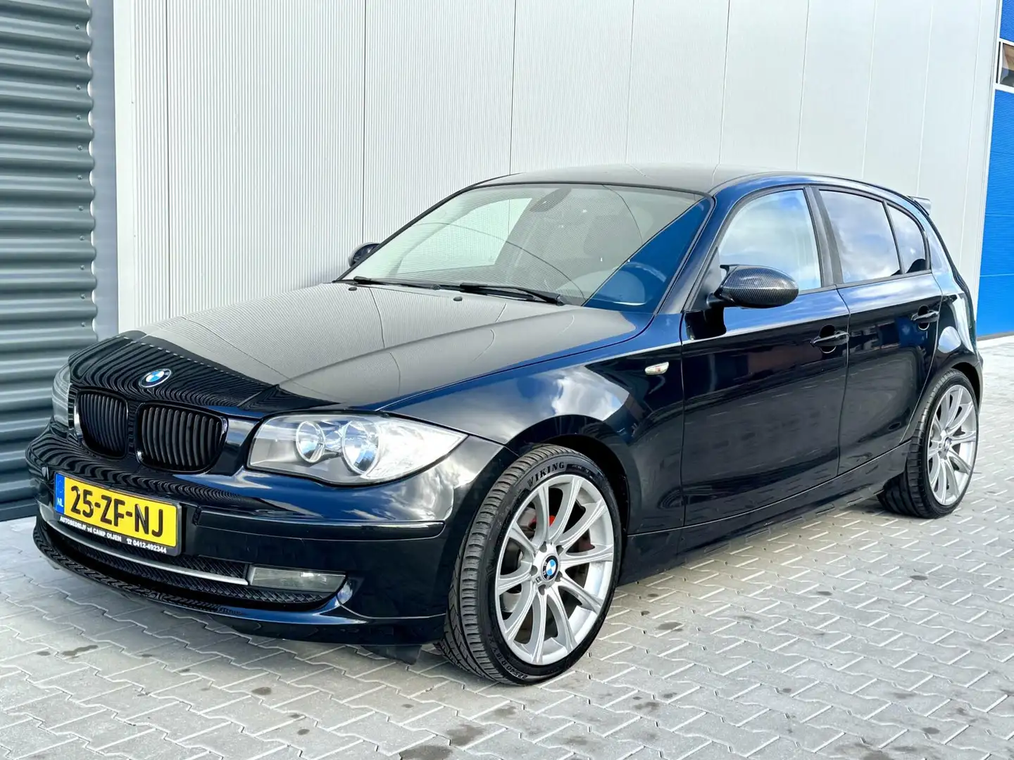 BMW 116 1-serie 116i High Executive | Navi | Nl auto | Fac Zwart - 1