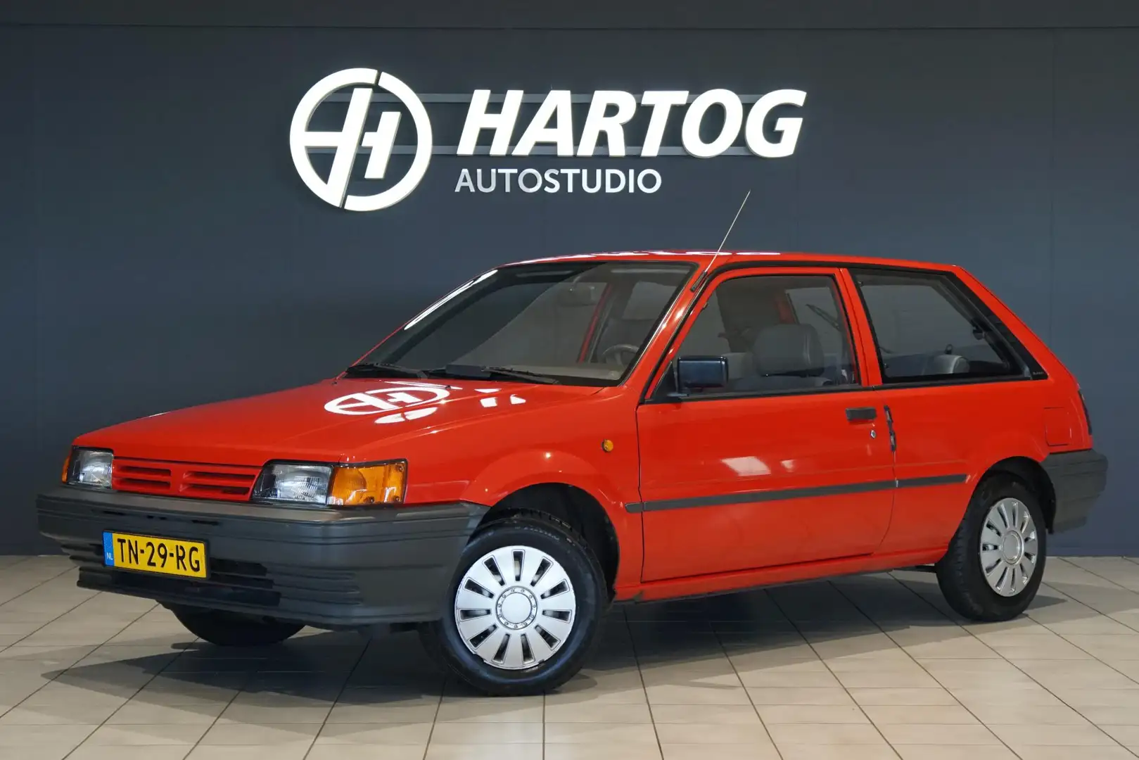 Nissan Sunny 1.3 Trend 1988 HATCHBACK *EERSTE EIGENAAR* Rouge - 1