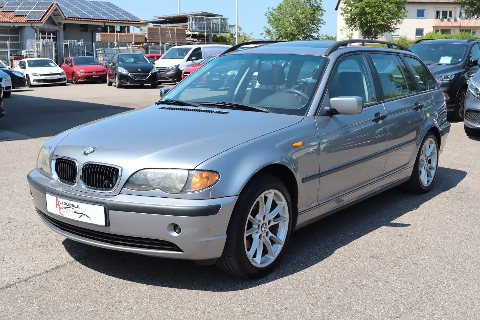 BMW 318 i Touring Klimaaut_SitzHz_PDC_Schiebedach Grau - 1
