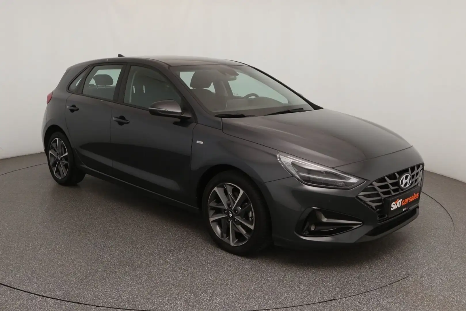 Hyundai i30 1.0 T-GDI Trend Navi|LED|Sitzhz|Kam|CarPl|17 Grau - 1