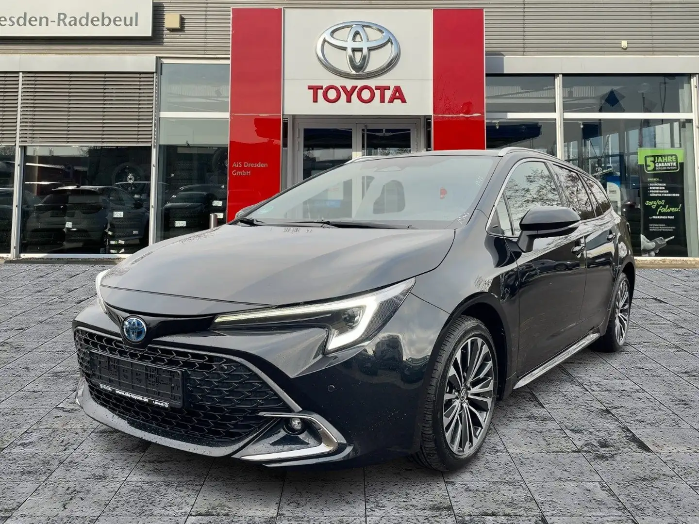 Toyota Corolla TS 1.8 Hybrid Teamplayer CloudNavi*ACC Noir - 1