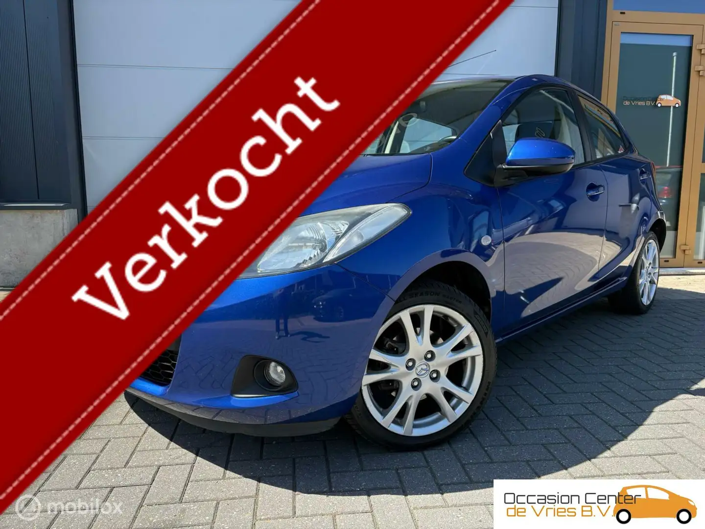 Mazda 2 1.3 GT-L 5drs Airco Velgen Stoelverwarming Bluetoo Blau - 1