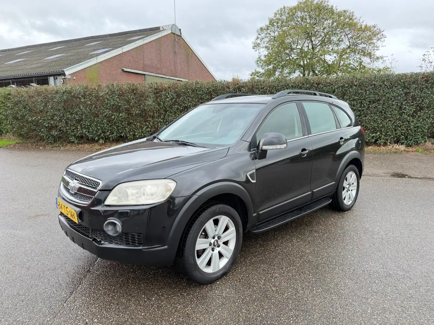 Chevrolet Captiva 3.2i V6 AUT - 4WD - 7 PERS. - APK 6/2026 Zwart - 2