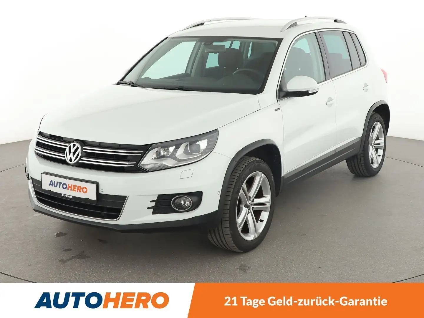 Volkswagen Tiguan 1.4 TSI Lounge Sport & Style BMT*BI-XENON*PDC*SHZ* Weiß - 1
