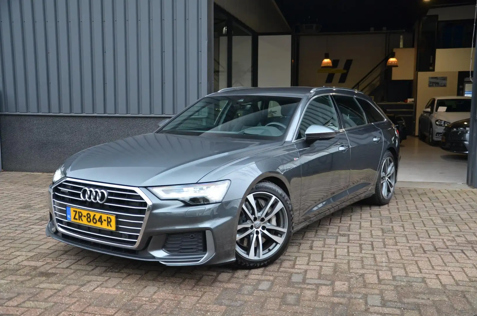 Audi A6 Avant 55 TFSI 340PK V6 quattro Sport S-line, Matri Grijs - 1