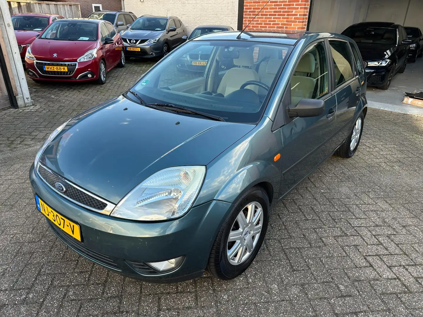 Ford Fiesta 1.4-16V Ghia AIRCO-CENTRAAL Groen - 2