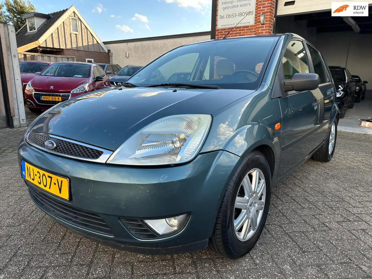 Ford Fiesta 1.4-16V Ghia AIRCO-CENTRAAL Groen - 1