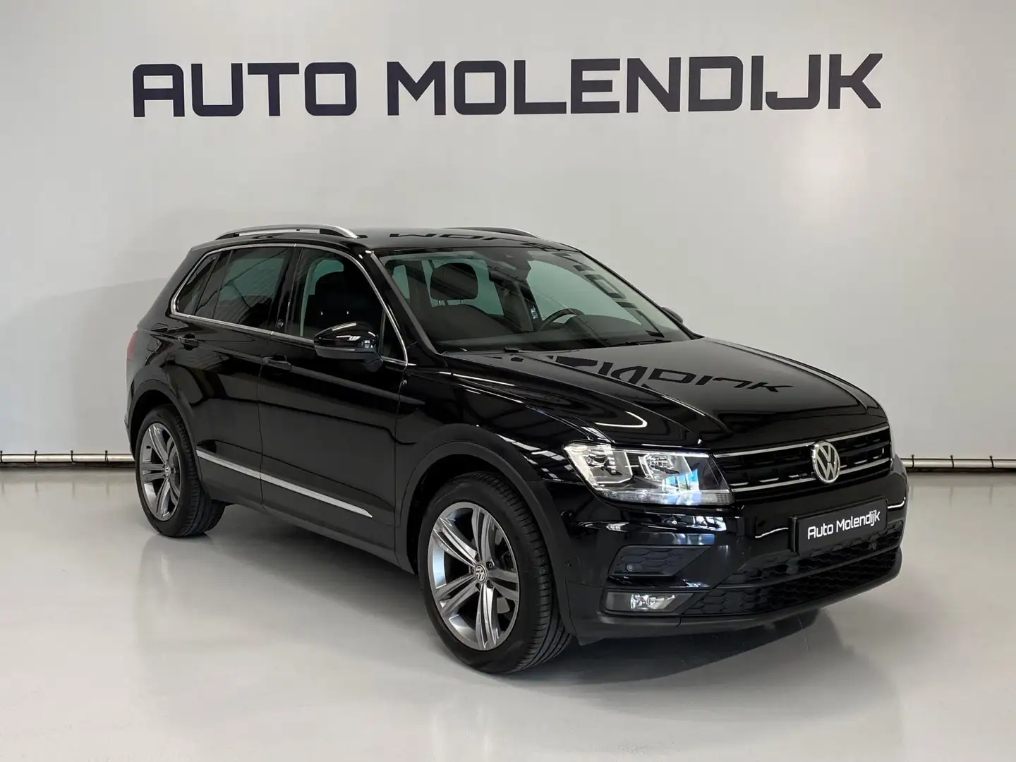 Volkswagen Tiguan 1.4 TSI / Navi / Adaptive cruise / trekhaak afn. / Zwart - 2