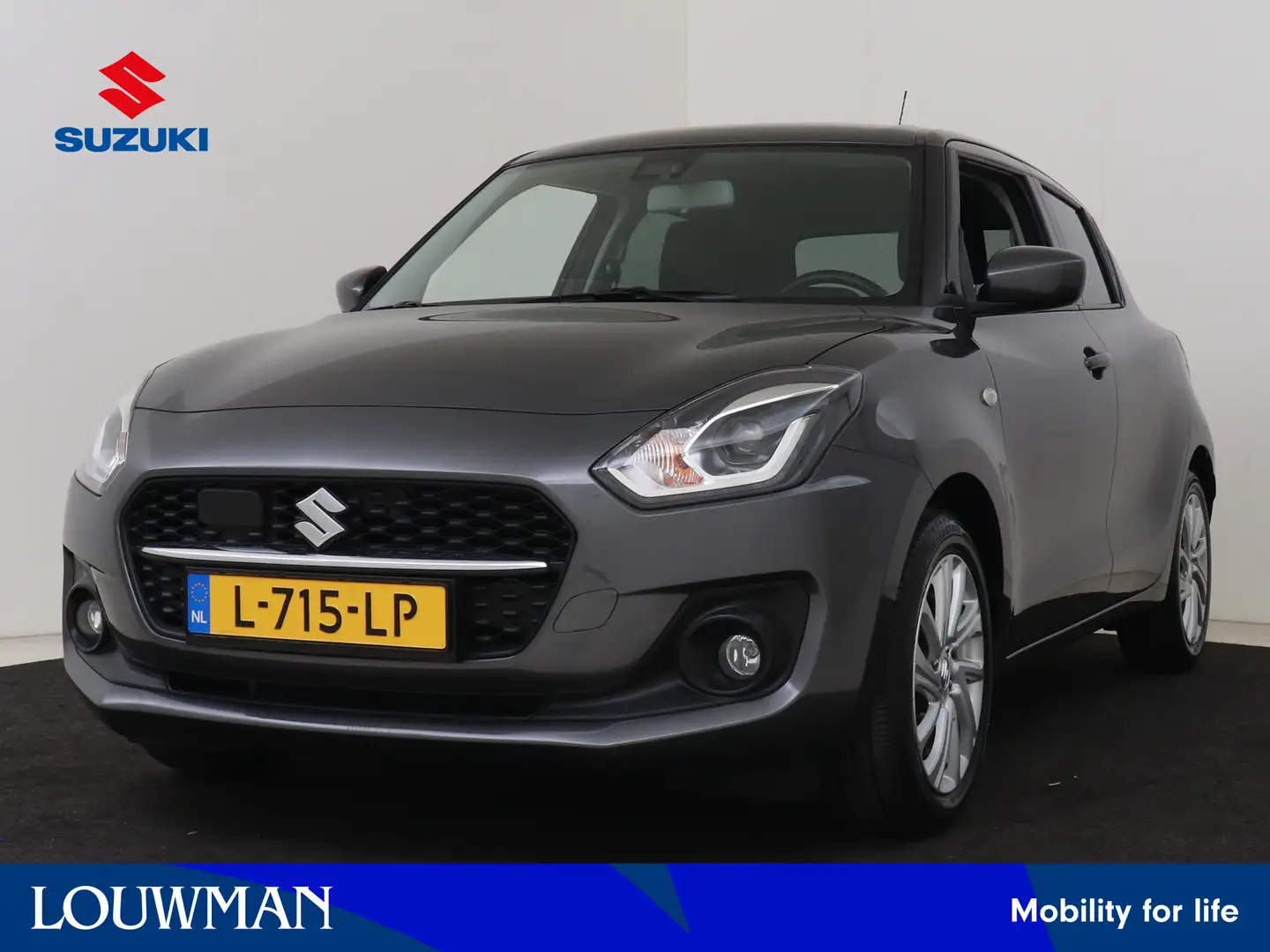 Suzuki Swift 1.2 Comfort Smart Hybrid Grijs - 1