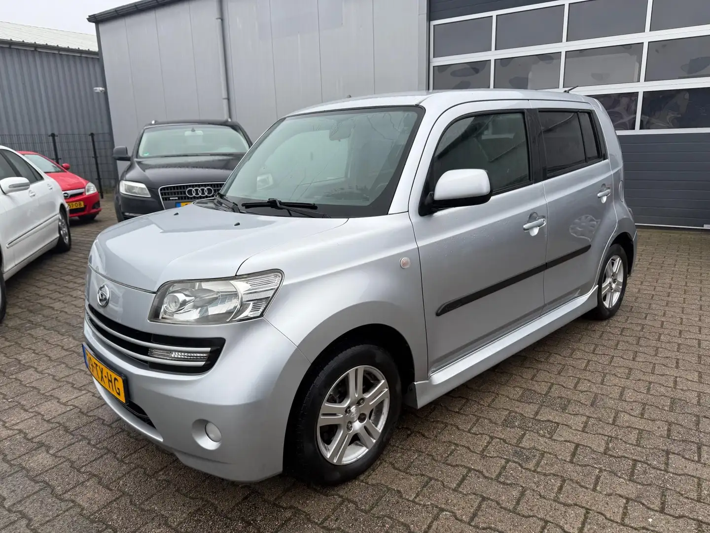 Daihatsu Materia 1.3 Funk 2007 LPG-G3 Airco 5-Deurs Grau - 1