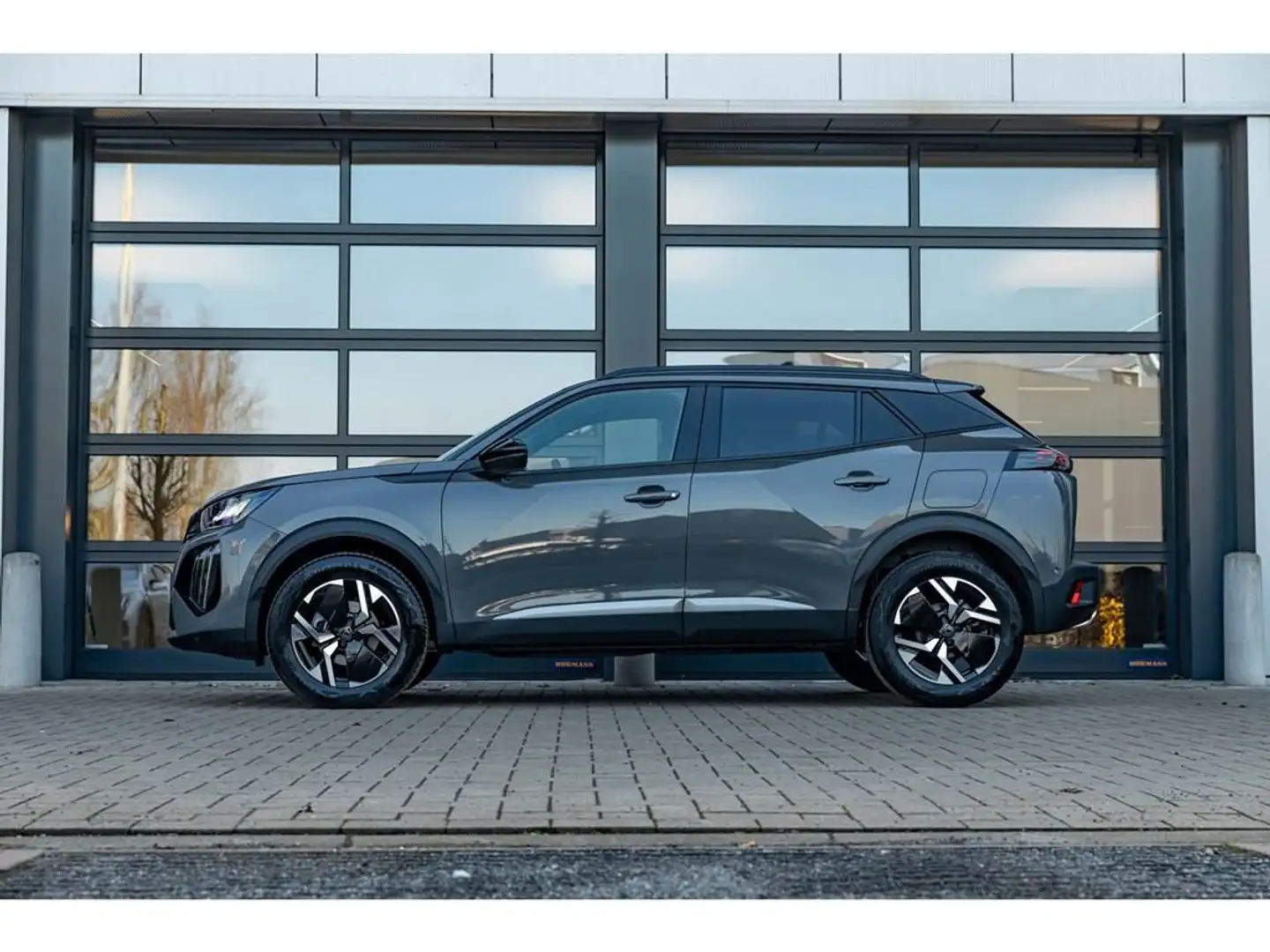 Peugeot 2008 145PK MHEV - Allure - Nieuw! - Navi - Keyless -... Grijs - 2