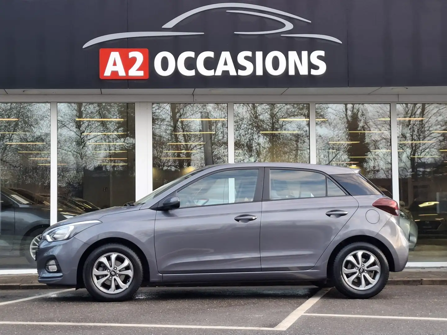 Hyundai i20 1.2 Cruise/Bluetooth/Stoel+Stuurverw/All Season ba Gris - 2