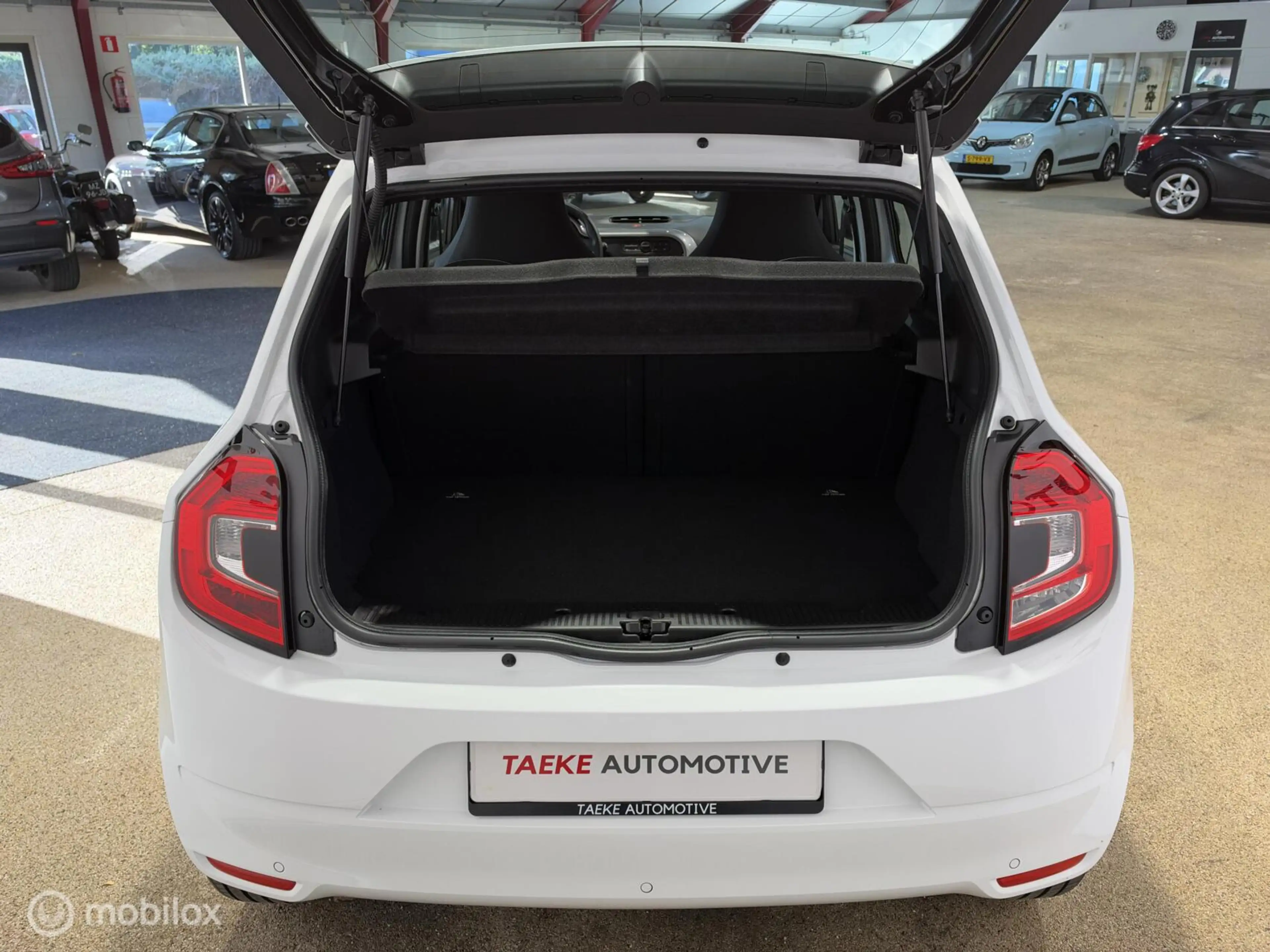 Renault Twingo Limited 1.0 SCe AIRCO/CRUISE/PDC/APK — photo 11