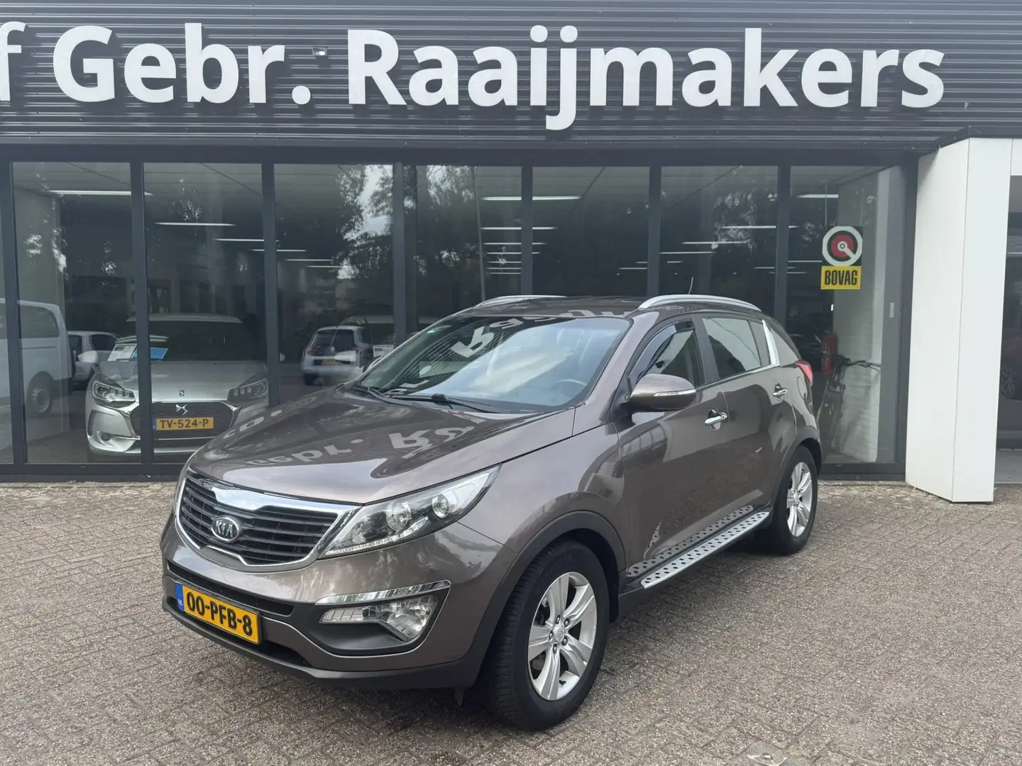 Kia Sportage 1.7 CRDI X-ecutive Plus Pack*Navigatie*Camera*EXPO Bruin - 1