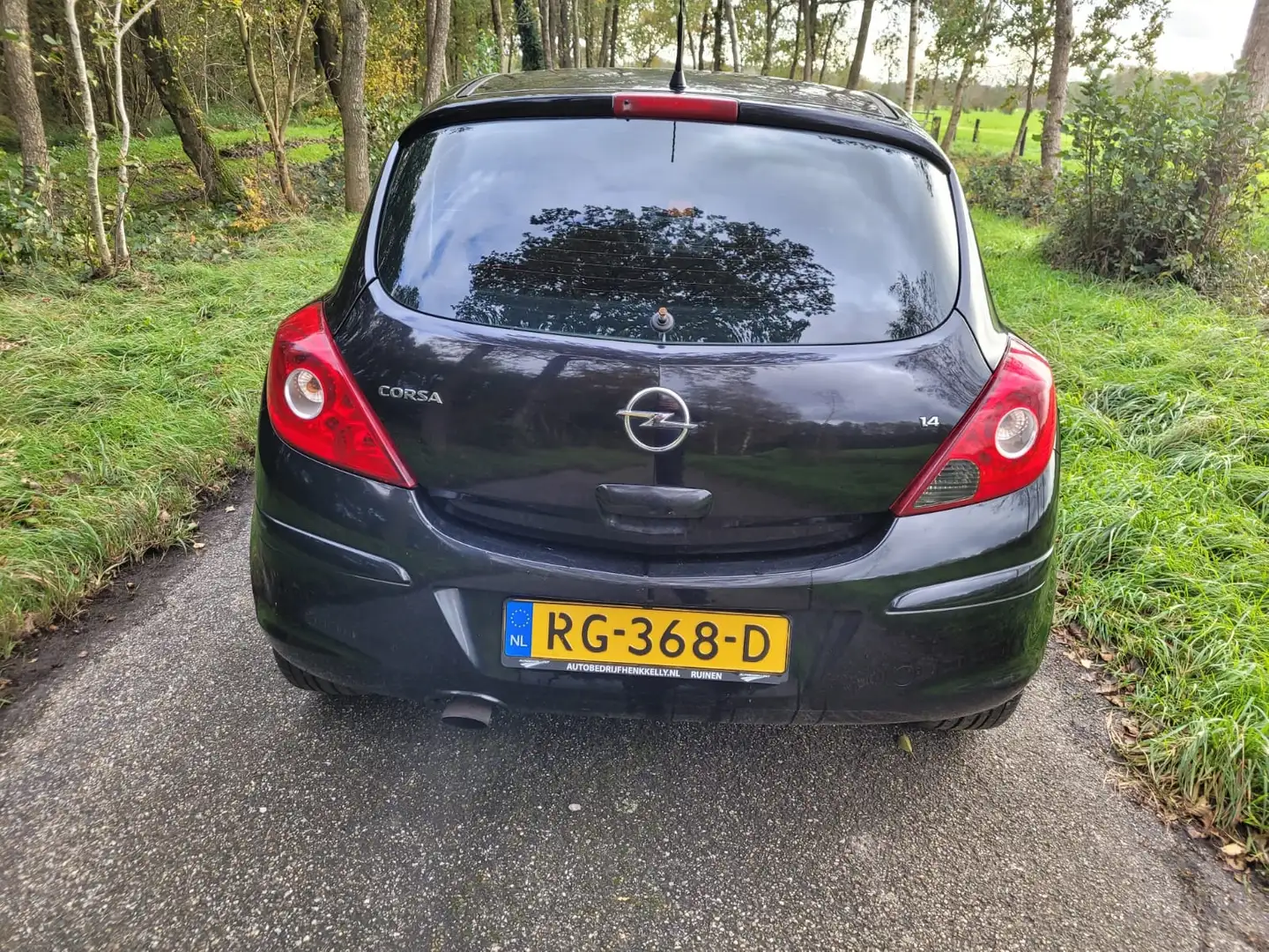 Opel Corsa 1.4-16V Enjoy Zwart - 2