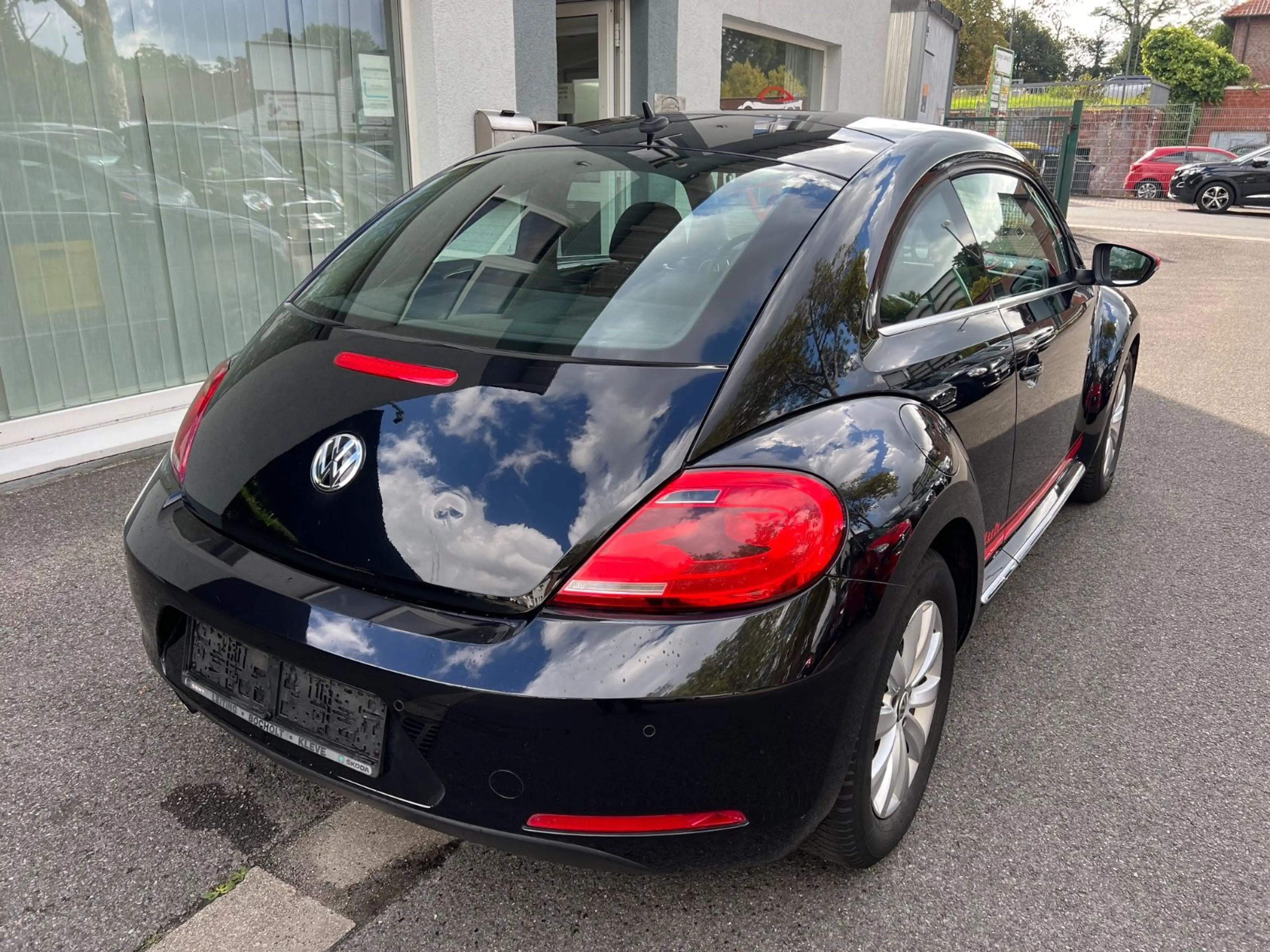 Volkswagen Beetle Lim. Design"2.HD"Scheckheft"Klimaaut."PDC — photo 11