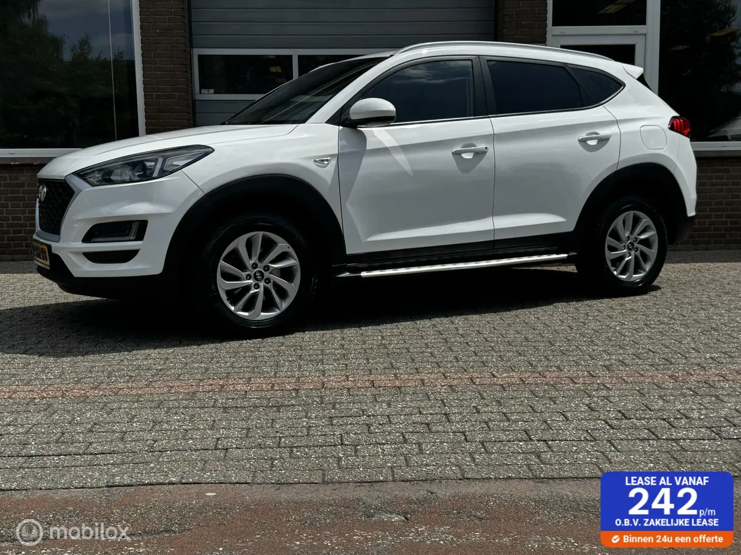 Hyundai TUCSON 1.6 GDI i-Drive ECC-AIRCO/NAVI/CRUISE/PDC Blanc - 1