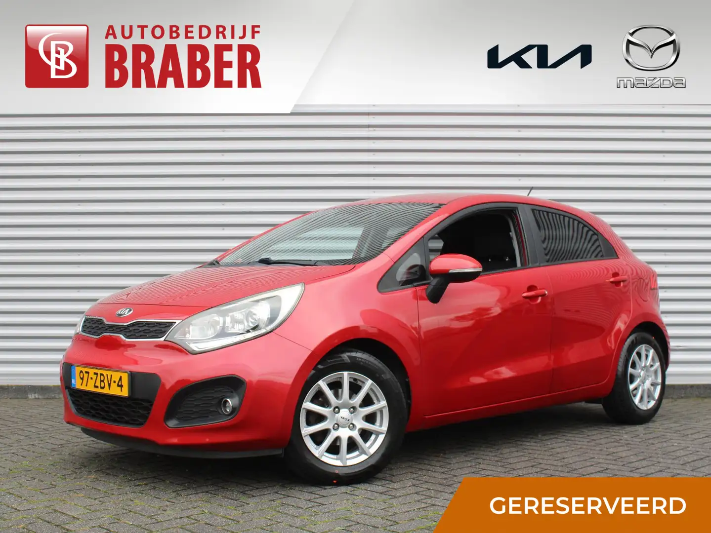 Kia Rio 1.2 CVVT Plus Pack | Airco | 15" LM | Elek. buiten Rood - 1