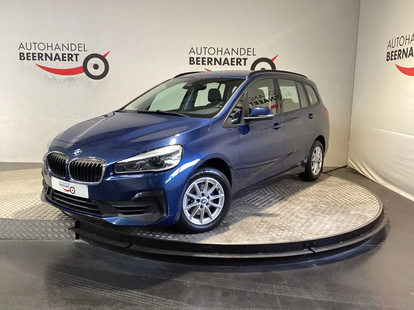 BMW 216 216i gran tourer/1Eig/62000km/Led/Pdc/Cruise/Nav Blauw - 1