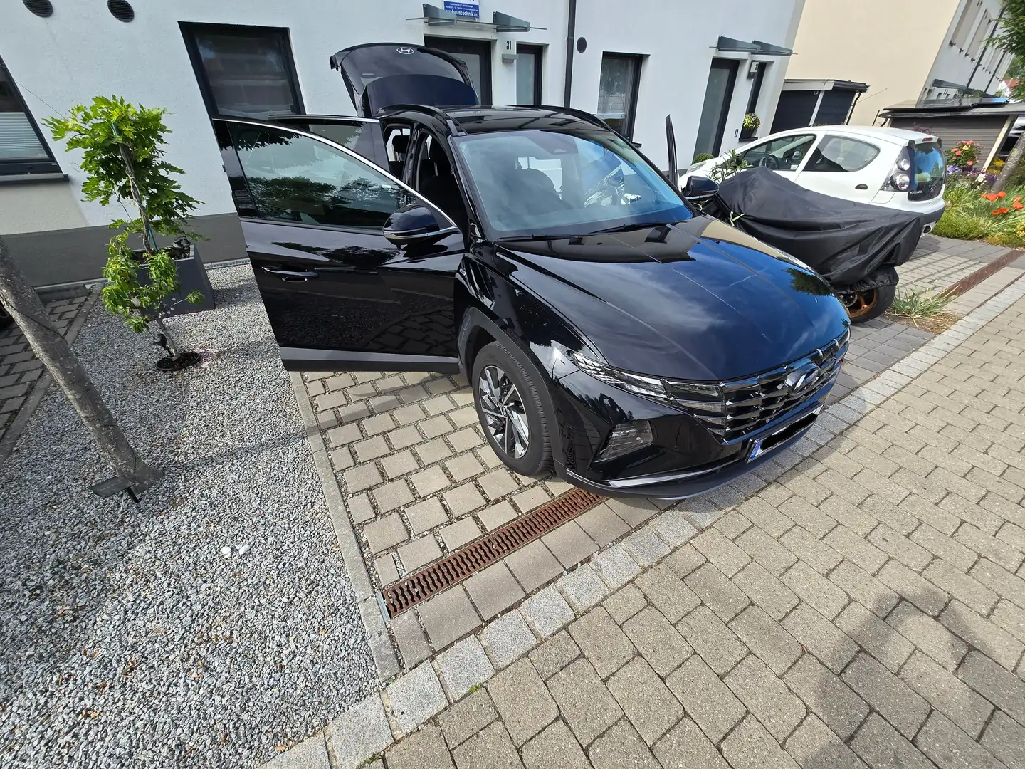 Hyundai TUCSON TUCSON 1.6 T-GDi 48V-Hybrid 4WD DCT Trend Noir - 1