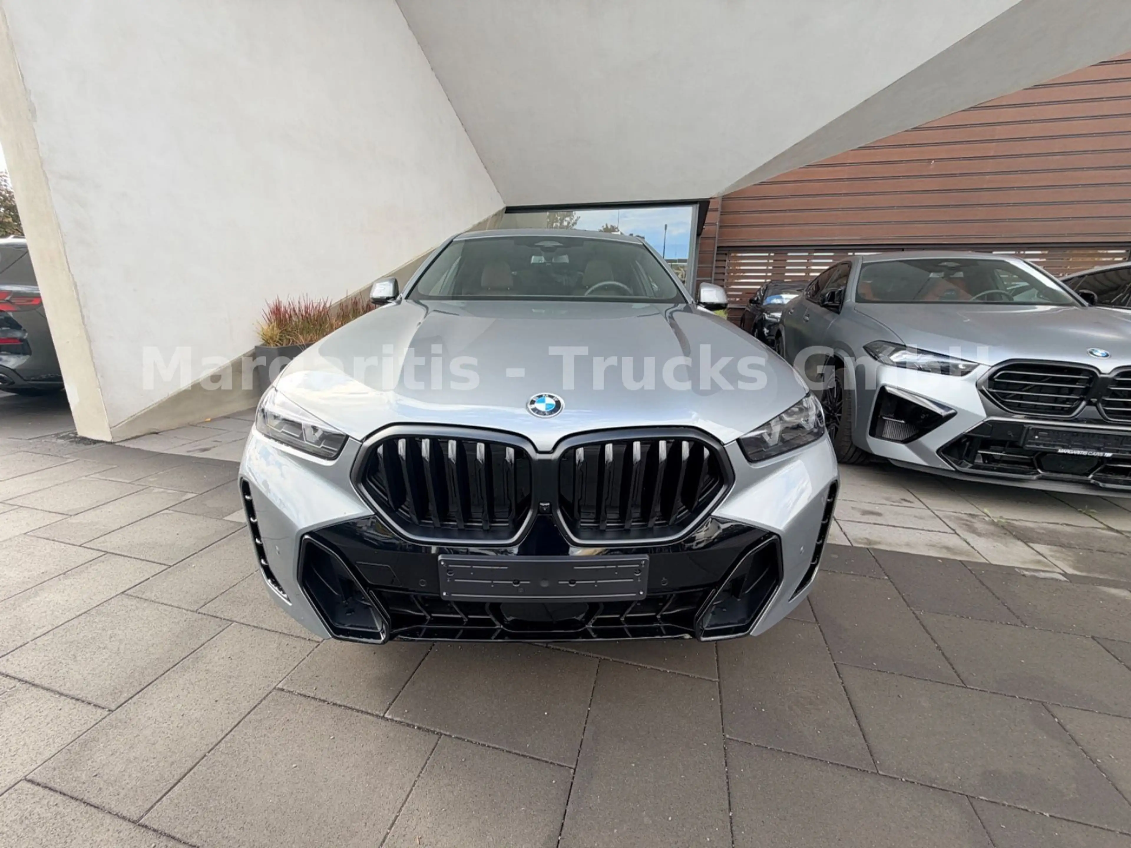 BMW X6 xDrive40d/22"/MPaketPro/Pano/Luft/SoftClose — photo 2