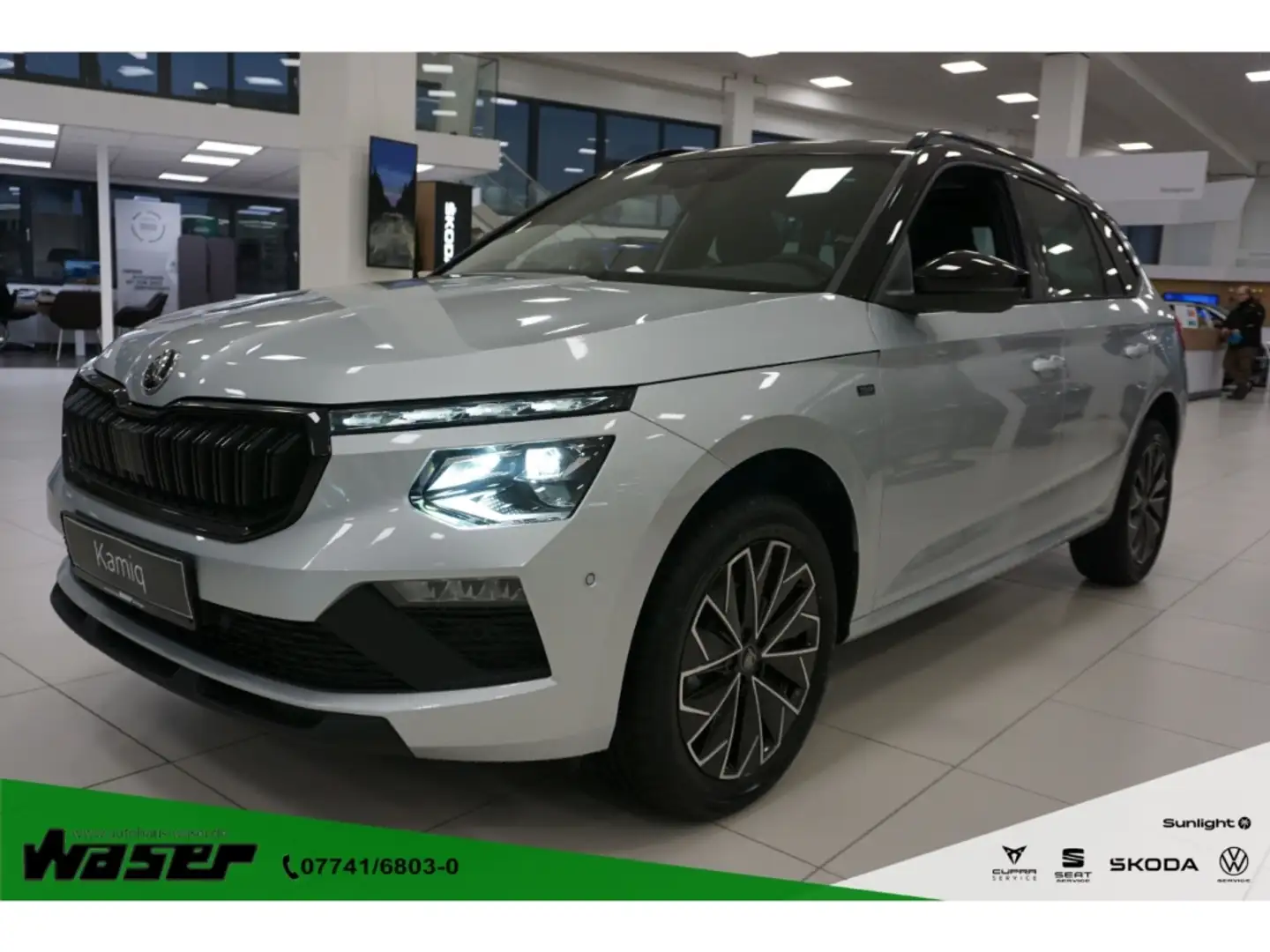 Skoda Kamiq 1.5 TSI Tour DSG Navi Matrix Pano ACC Kamera Dig.C Silber - 1