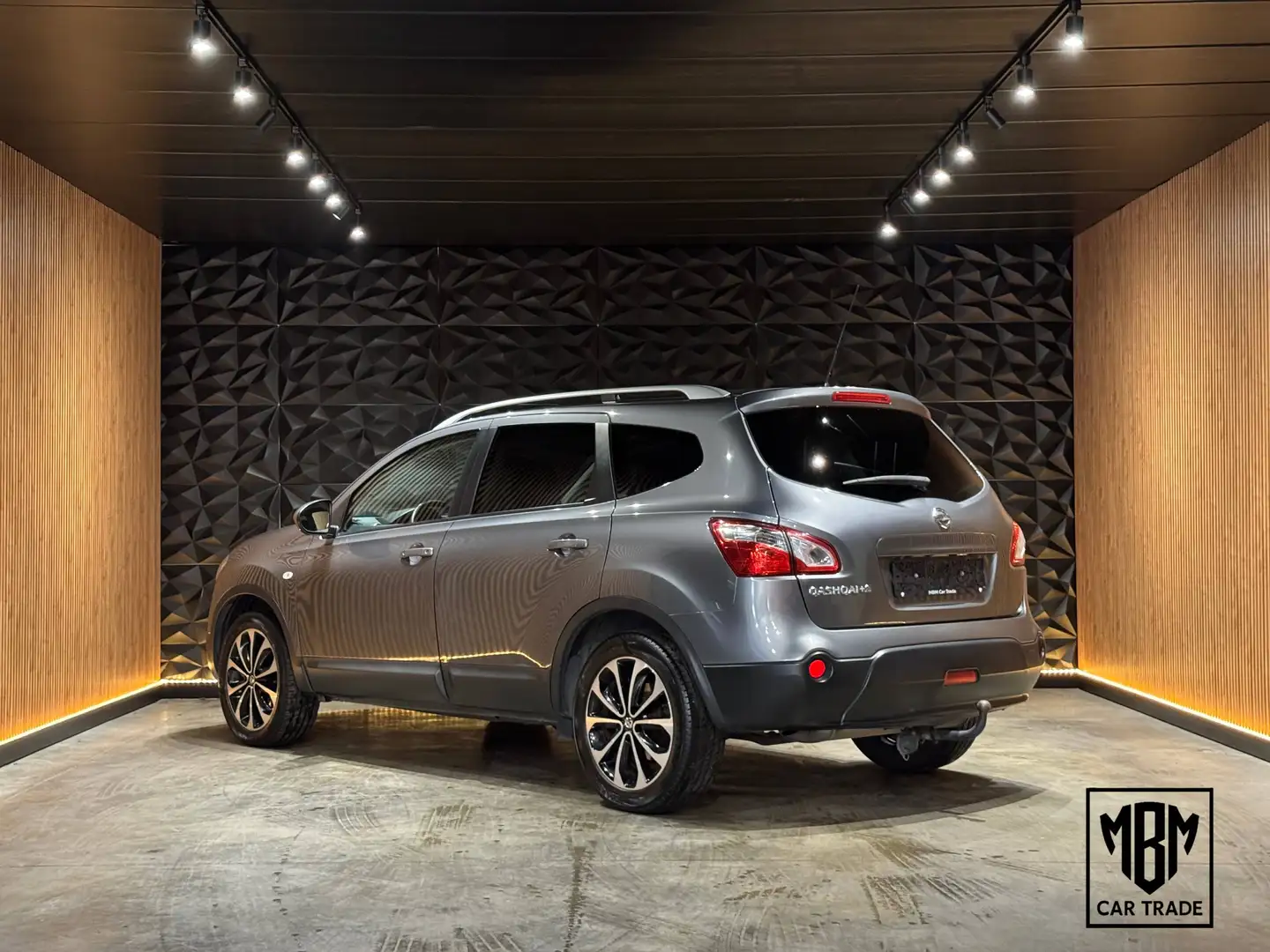 Nissan Qashqai+2 ✅1.6i 12 Maanden GARANTIE 7 Zitplaatsen Pano Airco Navi Camera Trekhaak 1.Eigenaar Grau - 2