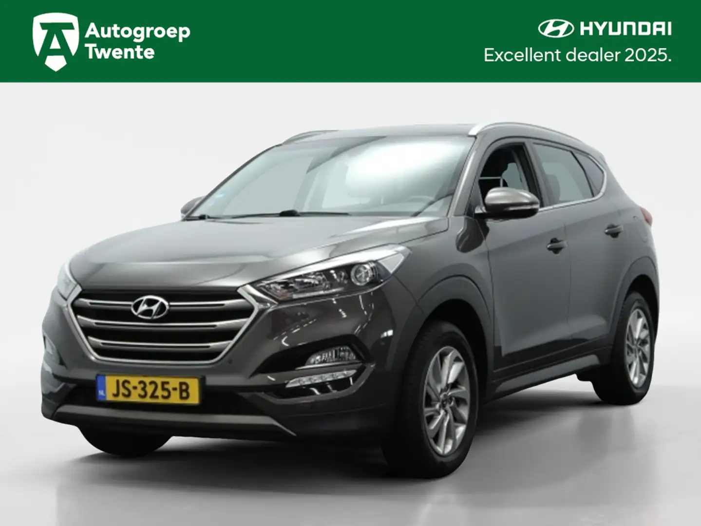 Hyundai TUCSON 1.6 GDi Comfort | Camera | Stoelverw. | DAB | Lich Bruin - 1