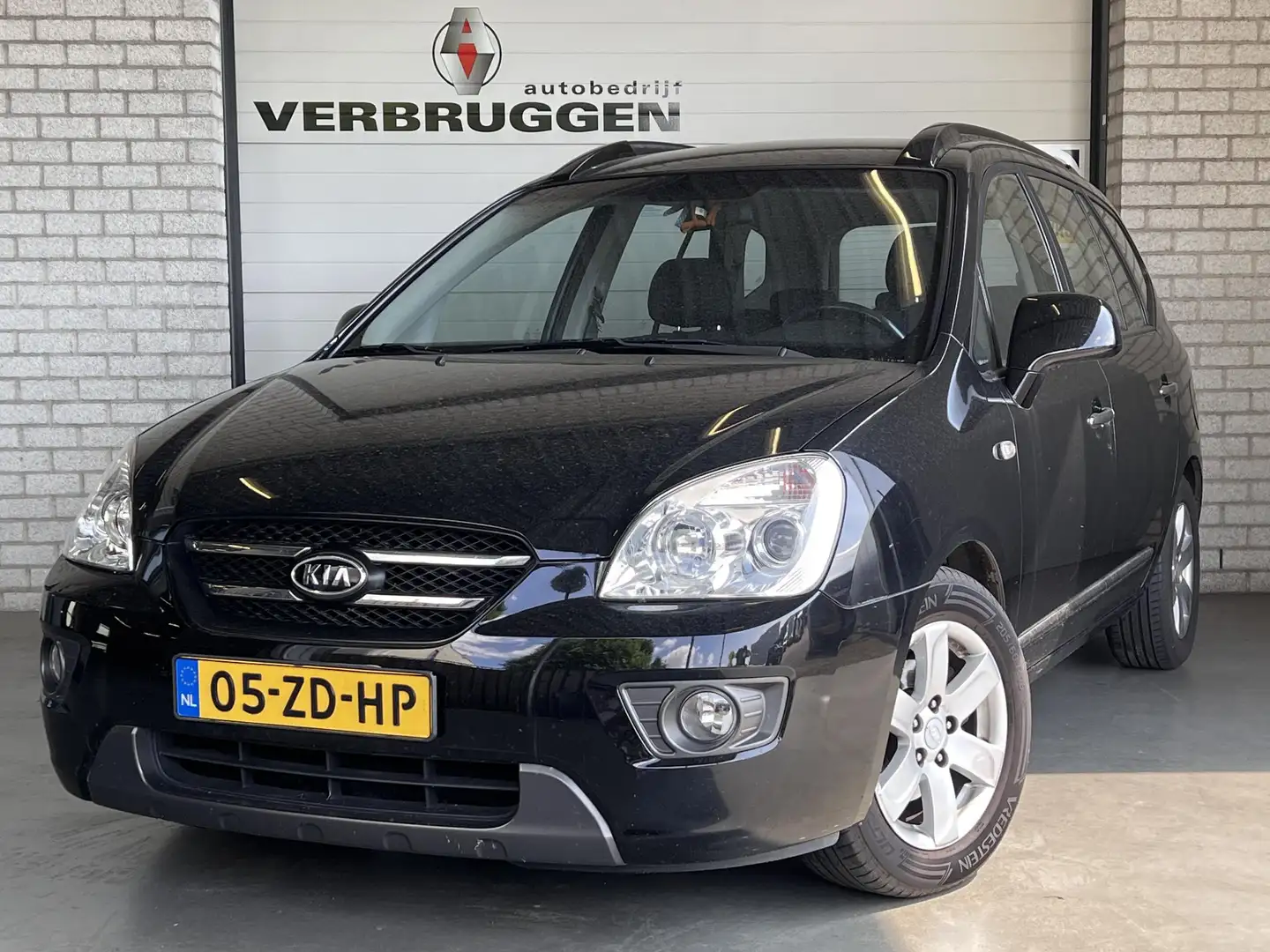 Kia Carens 2.0 CVVT X-ecutive | Trekhaak | Airco | LMV | Voll Nero - 1