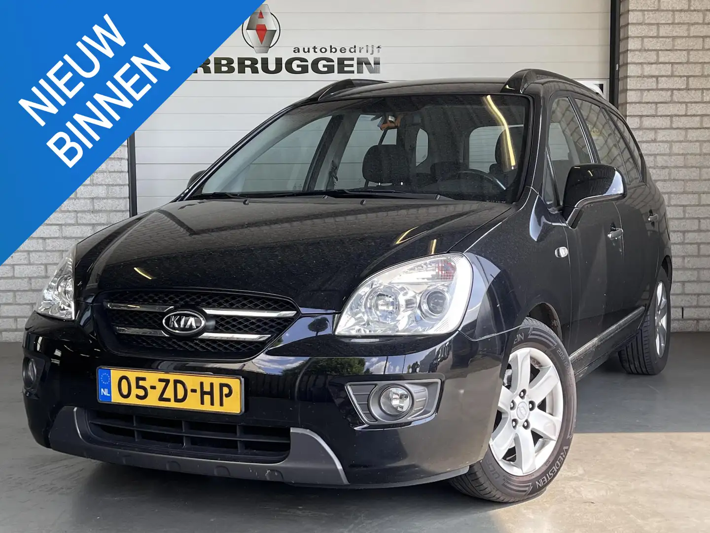 Kia Carens 2.0 CVVT X-ecutive | Trekhaak | Airco | LMV | Voll Negro - 1