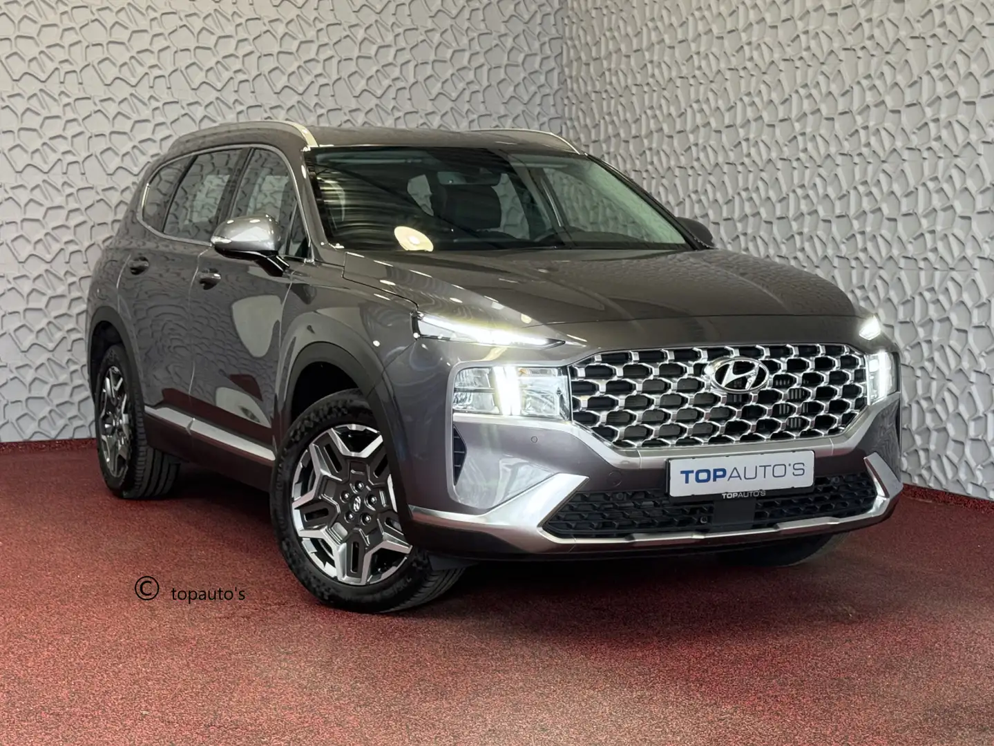 Hyundai SANTA FE 1.6 T-GDI PHEV PREMIUM 7P AWD LEER ELEK.KLEP CAMER Grijs - 1