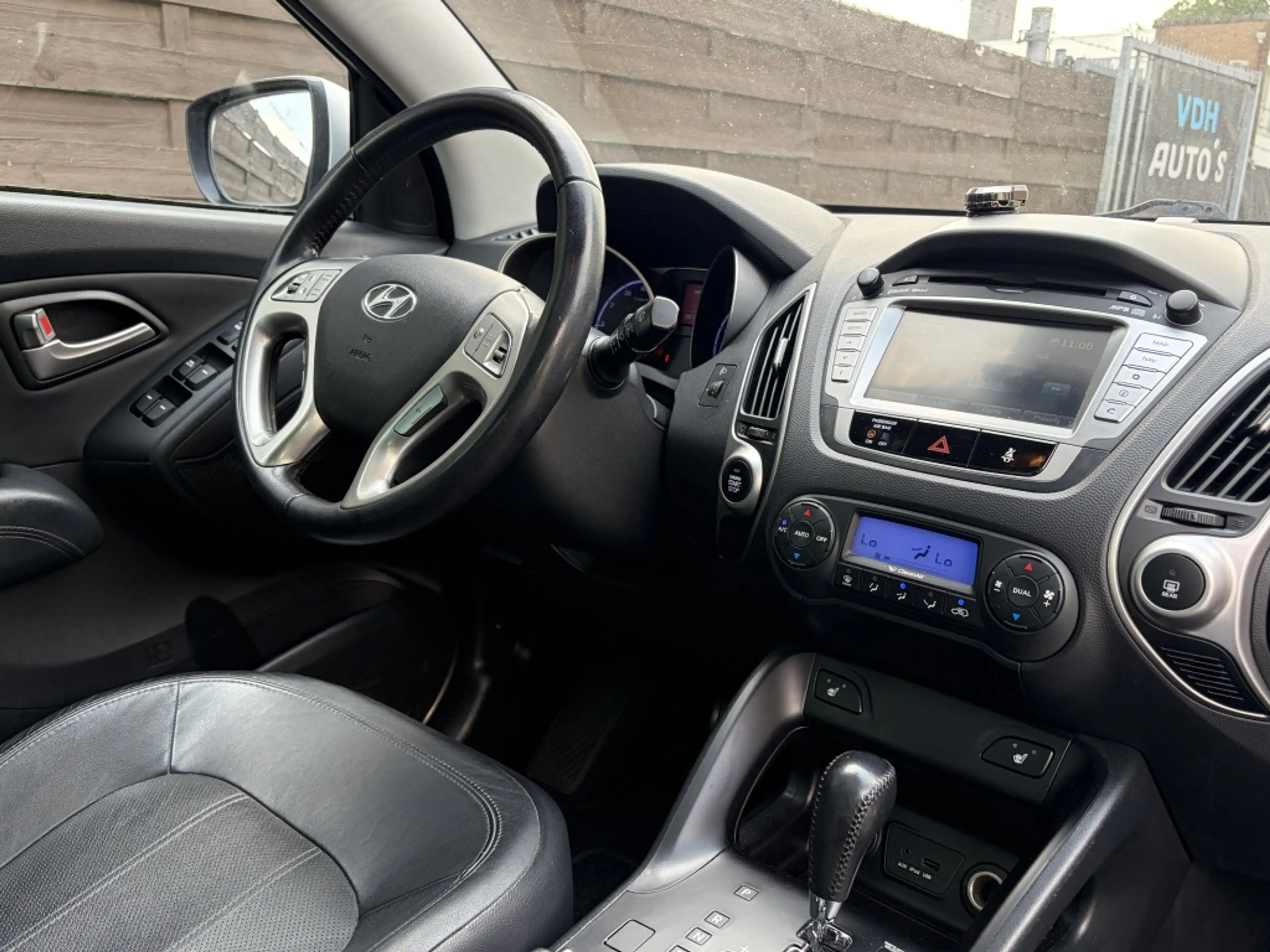 Hyundai iX35 2.0i i-Catcher AUT / Pano / Navi / Trekhaak / NAP — photo 4