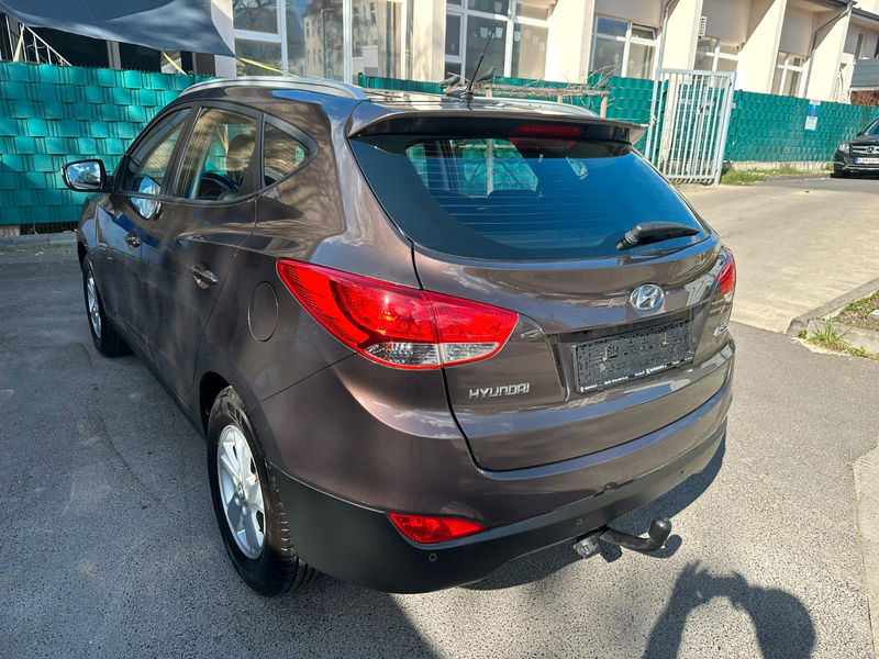 Hyundai iX35 2.0 Style 2WD*Aut*Leder*Navi*R_Cam*AHK*Top* — photo 4