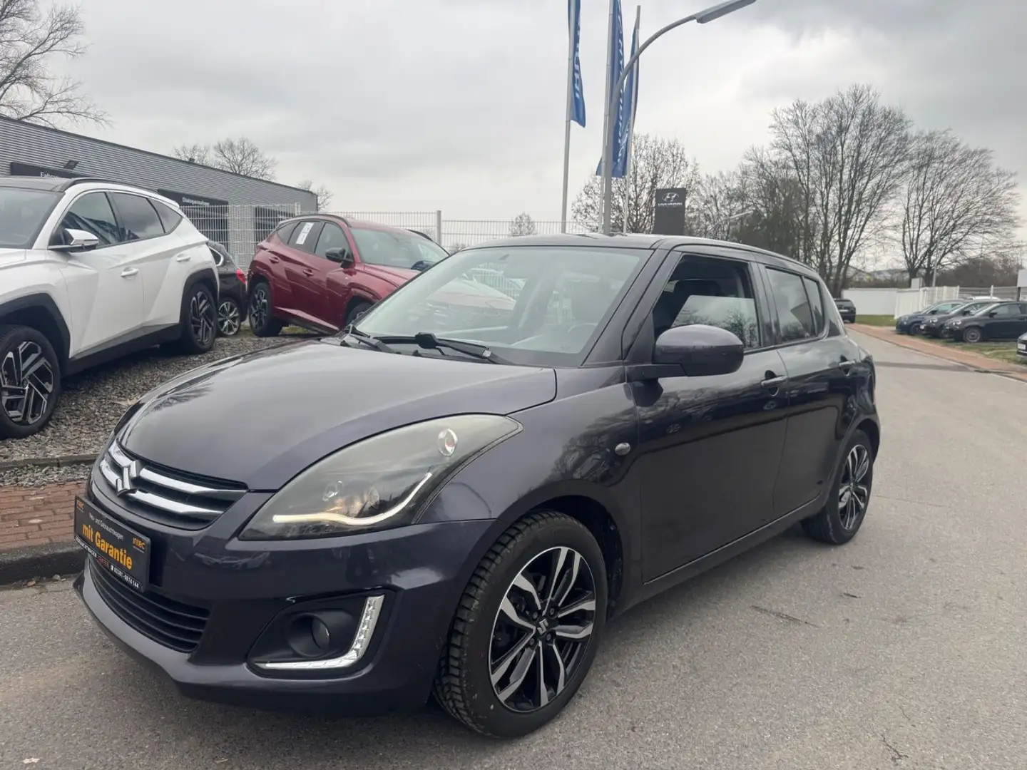 Suzuki Swift /CLUB/SPORT/2.HAND/KLIMA/T.LEDER/ALU/ Schwarz - 1