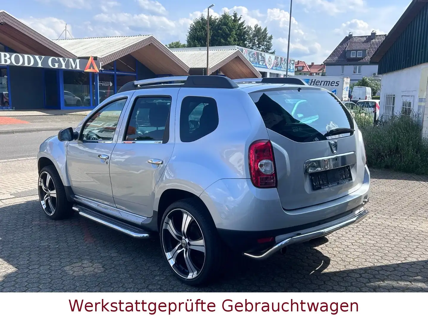 Dacia Duster I Prestige 4x2 NAVI*PDC*Leder*AHK* Ezüst - 2