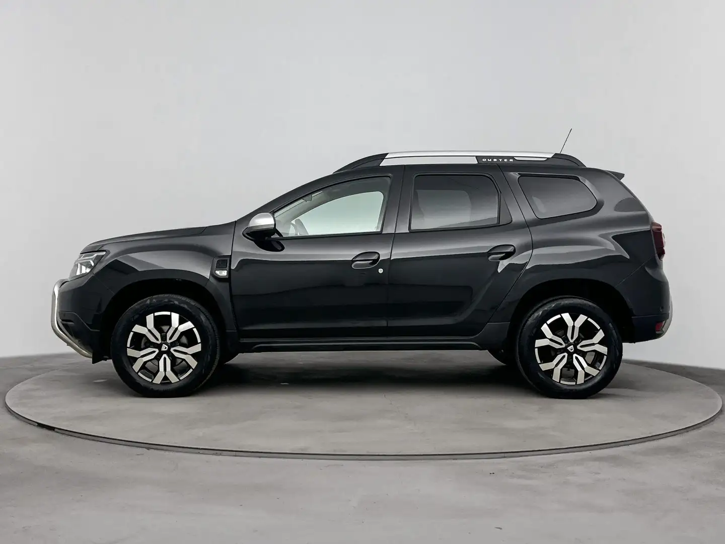 Dacia Duster 1.0 TCe Bi-Fuel Prestige 100PK | Navigatie | Leder Zwart - 2