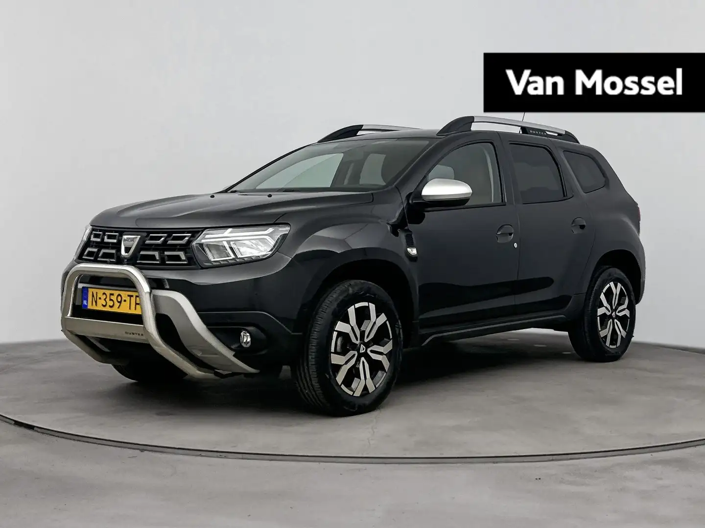 Dacia Duster 1.0 TCe Bi-Fuel Prestige 100PK | Navigatie | Leder Zwart - 1